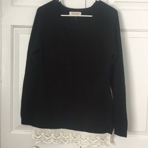 Black tunic sweater with crochet details